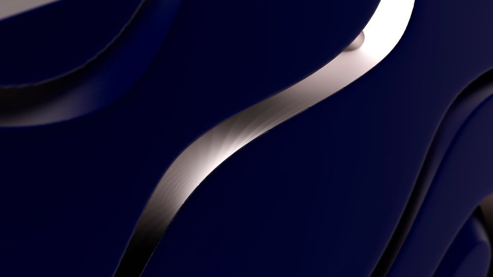 Smooth abstract dark blue curves with metallic silver reflections in a modern artistic design.