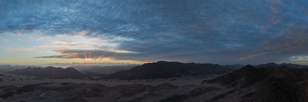 Sunrise over the mountains and valley of Hoanib River Valley, landscape, wildlife, Kunene Region, Namibia.