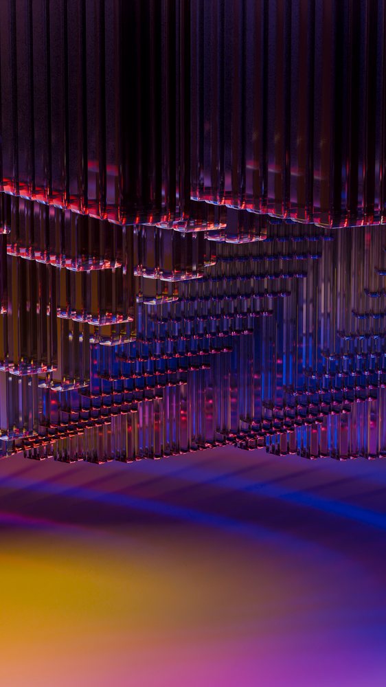 Digital illustration featuring an abstract geometric pattern of transparent glass shapes with colorful purple, red, blue, and yellow lighting and gradient shadows.