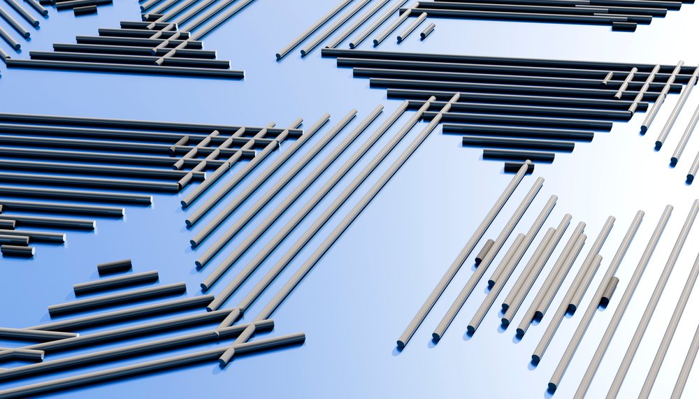 Metal rods arranged in parallel and geometric patterns on a reflective blue surface.