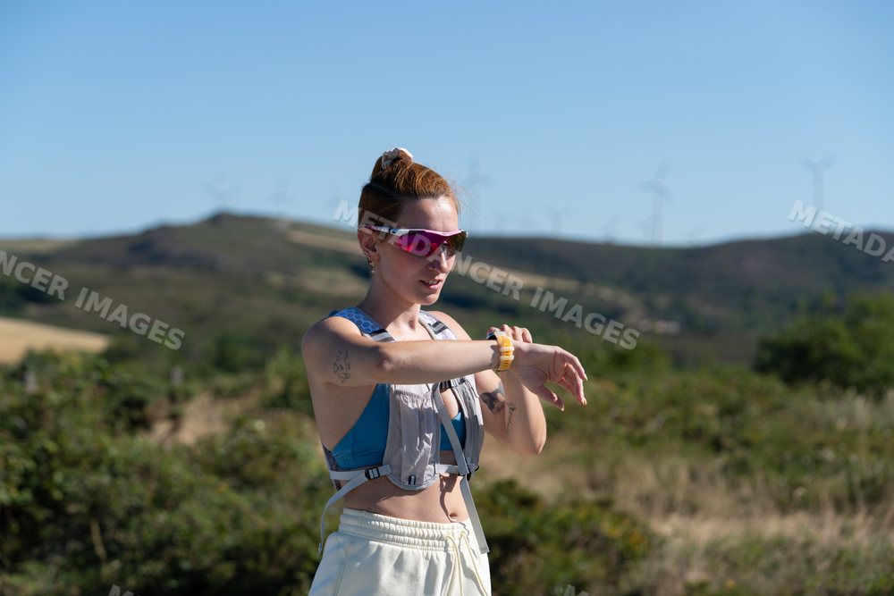 White Woman checking fitness watch