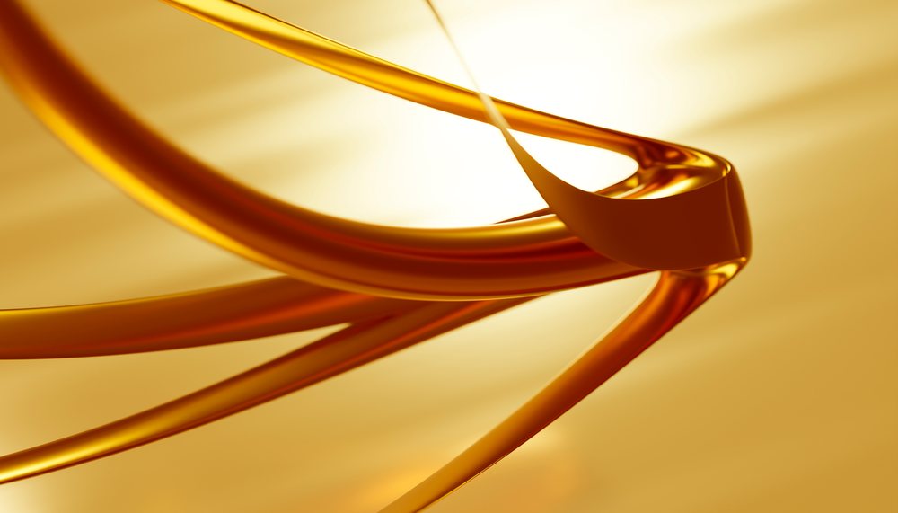 Abstract flowing golden ribbons twisting in smooth loops on a bright background.