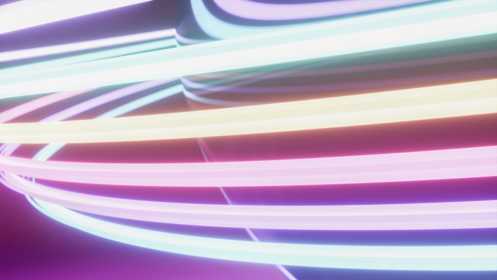 Curved neon light tubes glow vibrantly with pink, white, blue, and yellow hues against a purple background in an abstract digital illustration.
