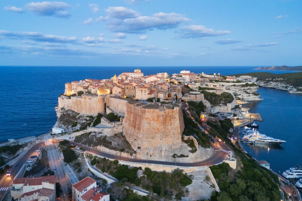 Harbour and Citadel at dawn, overlooking the Mediterranean Sea with boats in the marina, Travel Photography, Bonifacio, Corsica, France.