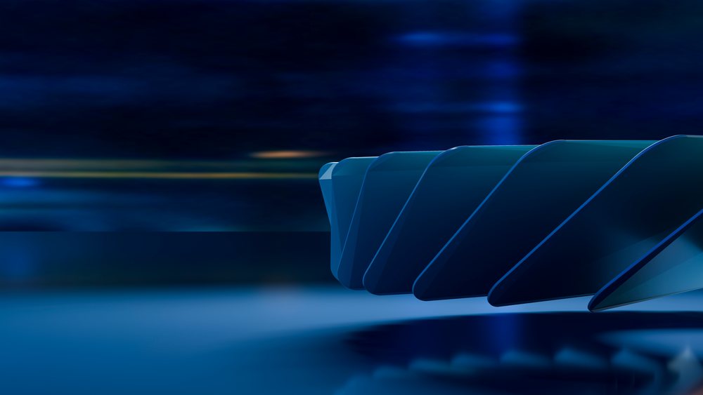 Abstract blue geometric shapes create a modern digital pattern with light reflections and a futuristic design.