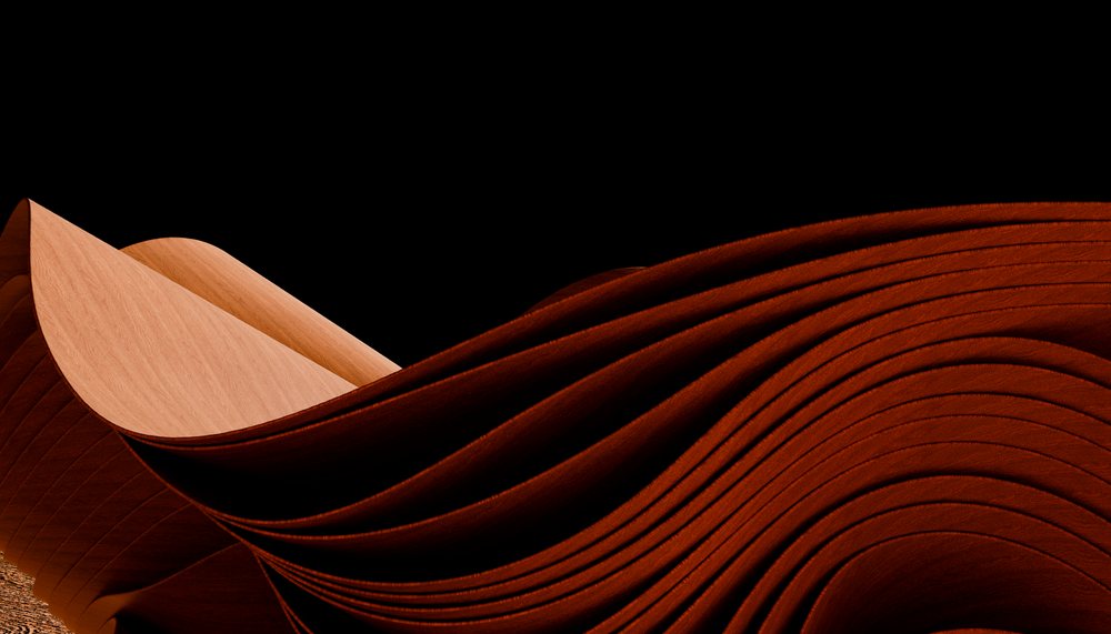 Curved and layered sheets of wood showing smooth flowing texture and natural wood grain patterns on a black background.