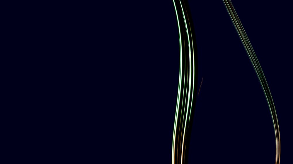 Abstract digital illustration showing glowing curved light trails on a dark background that create dynamic flow and motion.