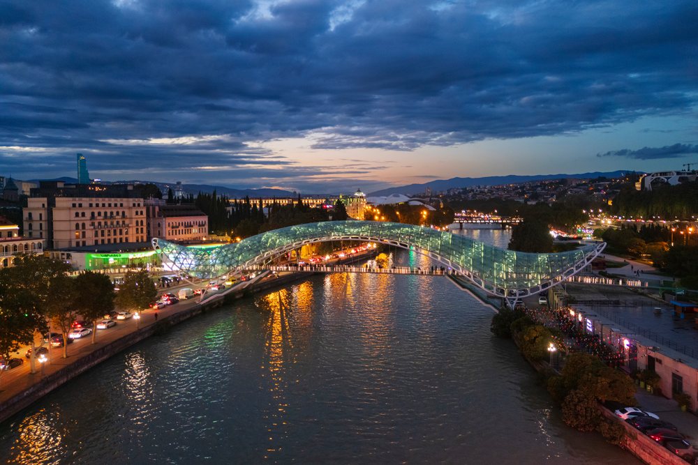 The Bridge of Peace spans the Mtkvari River at Dusk, Cityscapes, Tbilisi, Georgia.
