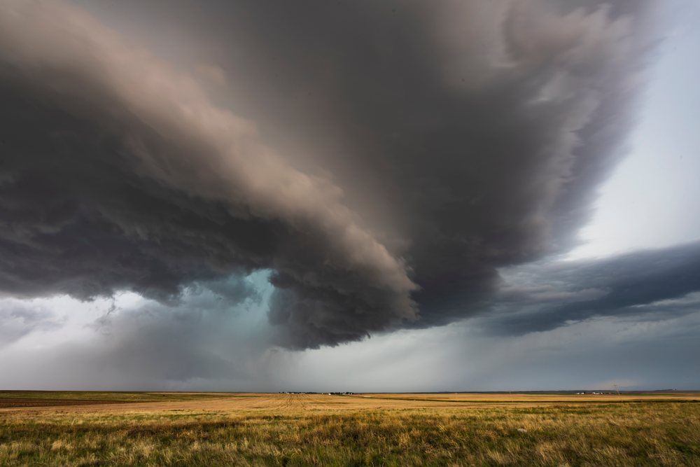 Tornado-warned Supercell storm forms over open grassland, within the Great Plains, Merino, Colorado, USA.