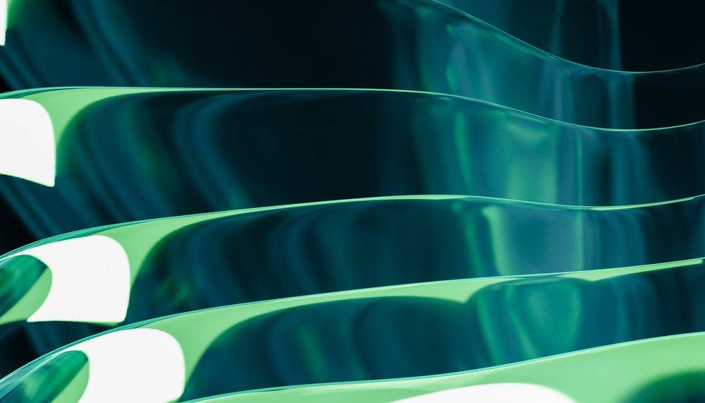 Artistic abstract rendering of smooth green and blue wave shapes with glossy fluid surfaces and color gradients, abstract render background.