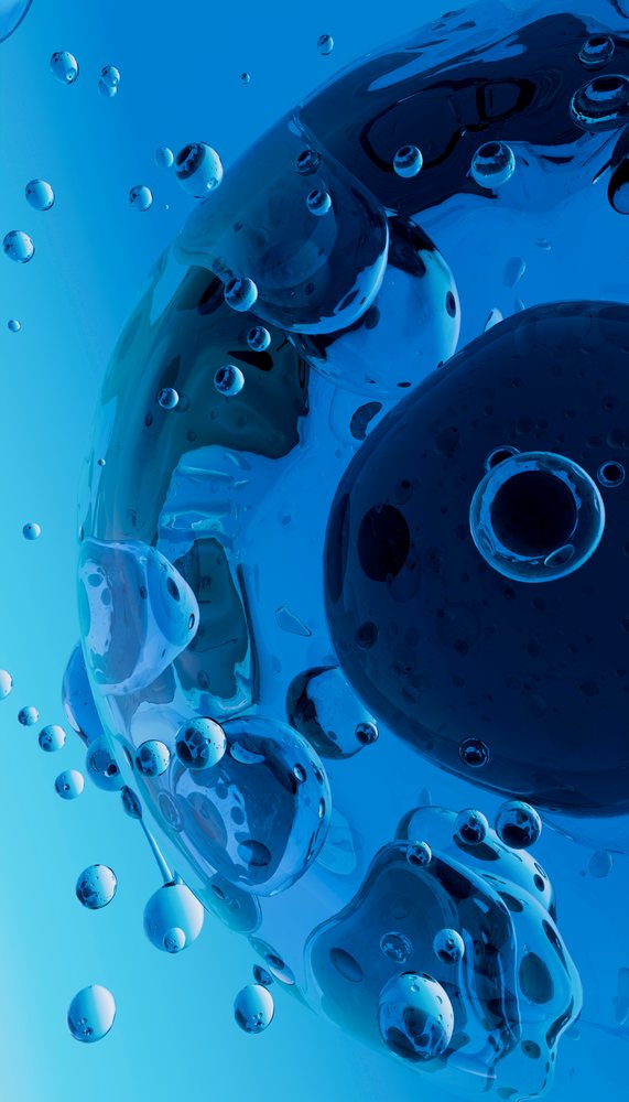 Blue transparent bubbles and droplets floating in liquid creating an abstract fluid effect against a blue background.