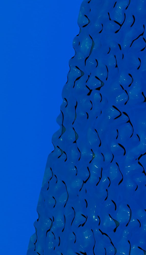 Facade of a blue building featuring curved glass elements that form a wavy reflective architectural pattern.