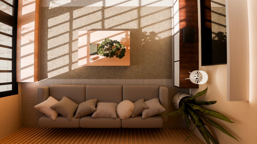 Modern living room featuring a sofa with cushions, wooden coffee table with a decorative plant, floor lamp, carpet, and natural window light casting shadows.