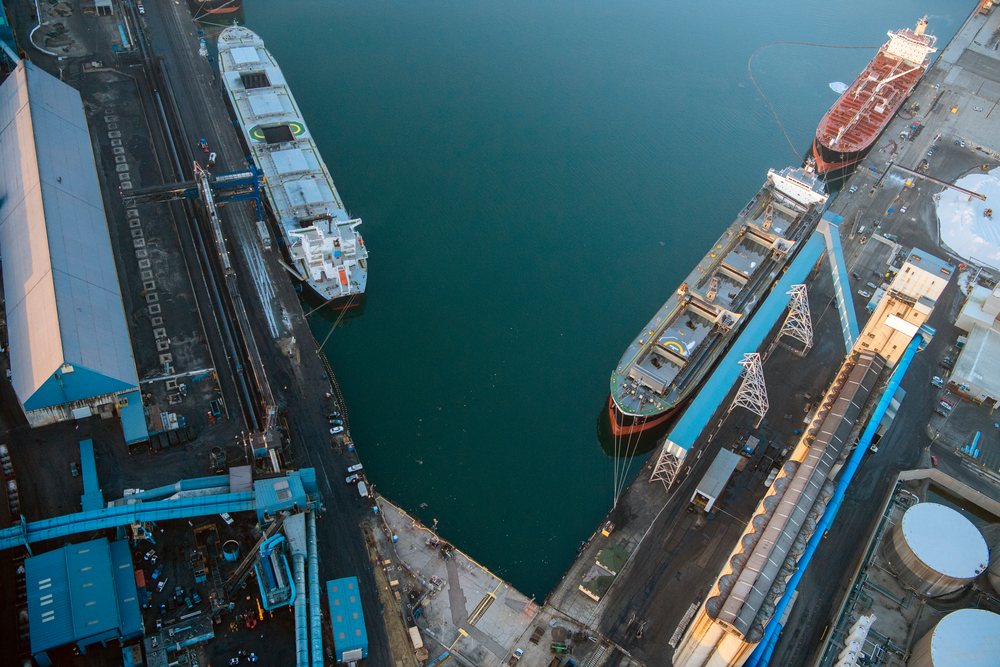 Cargo ships docked at an industrial shipping terminal at the, Port of Long Beach, CA, USA.