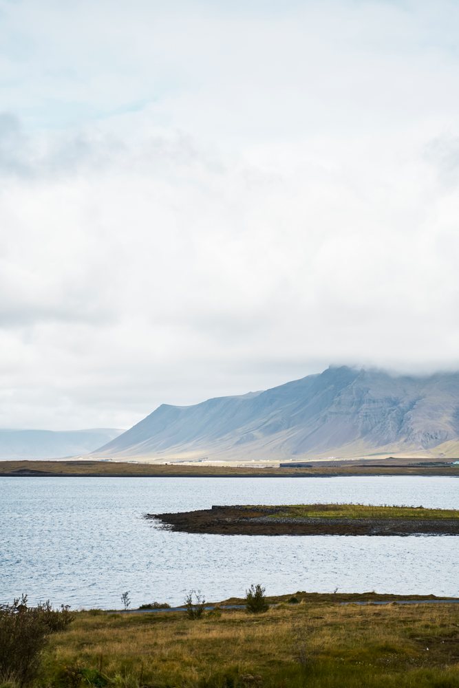 Mountain and lake landscape with clouds