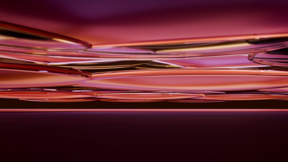 Abstract digital illustration featuring layered smooth curved shapes in vibrant pink, purple, and orange tones with reflective surfaces.