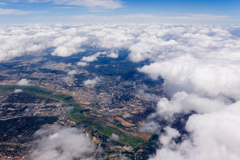 Aerial view of dallas city skyline with clouds, Texas, USA.