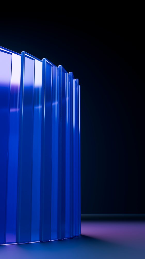 Curved translucent blue glass panels vertically arranged in a circular shape with purple gradient lighting in a dark minimalist studio.