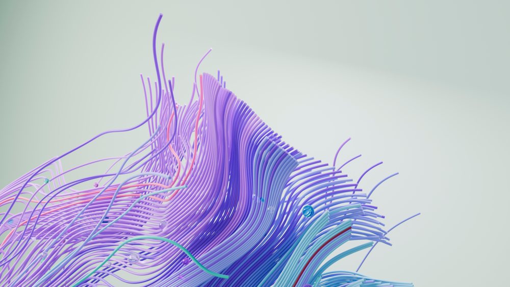 Colorful flowing strands in blue, purple, and pink curve dynamically in a 3D digital abstract illustration.
