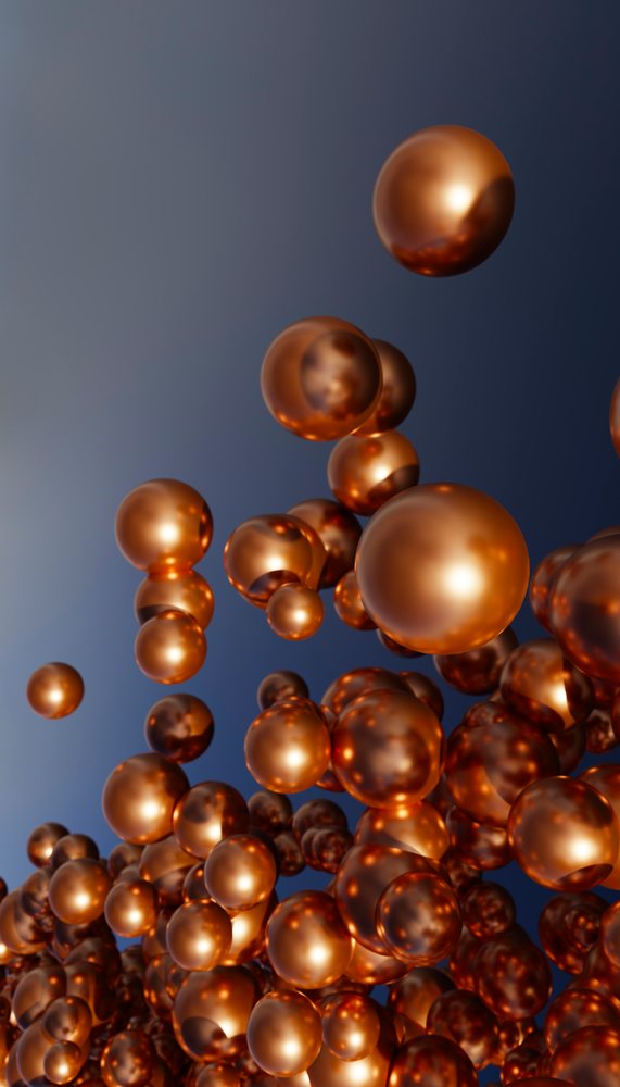 Cluster of floating copper-colored metallic spheres against a gradient blue background.