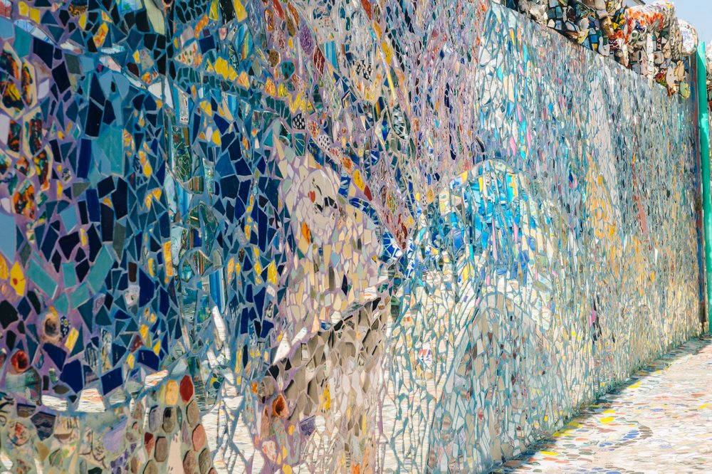 Colorful ceramic and mirror tile mosaic artwork outdoors, CA, USA.
