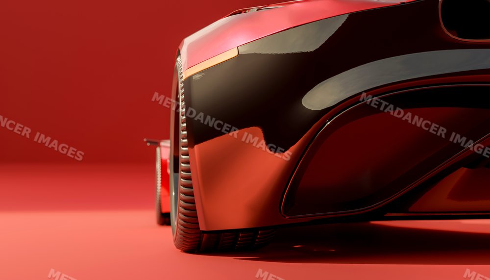 Close-up of a red vehicle's wheel and fender on a matching red