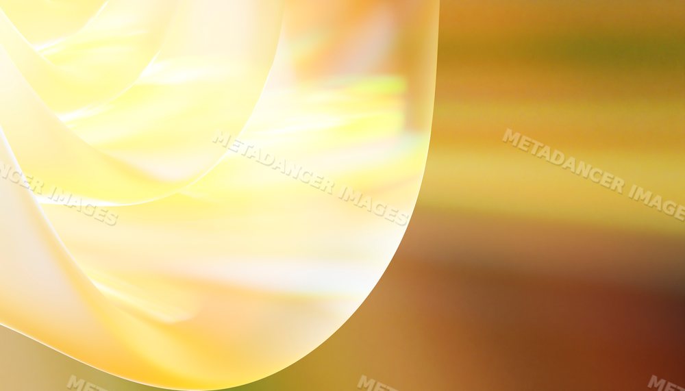 Abstract image of soft glowing yellow and golden curved shapes