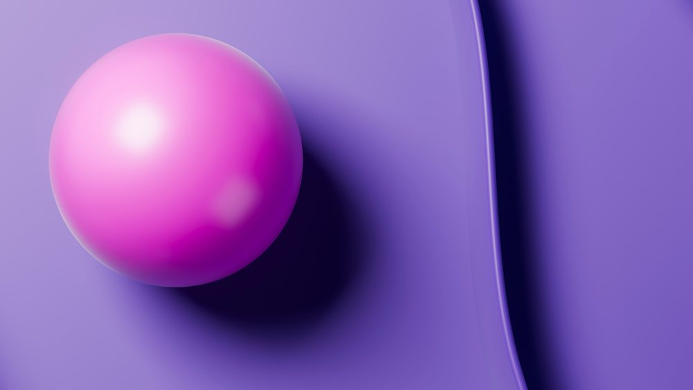 Glossy pink sphere casting a shadow on a smooth purple surface in an abstract minimalist 3D illustration.
