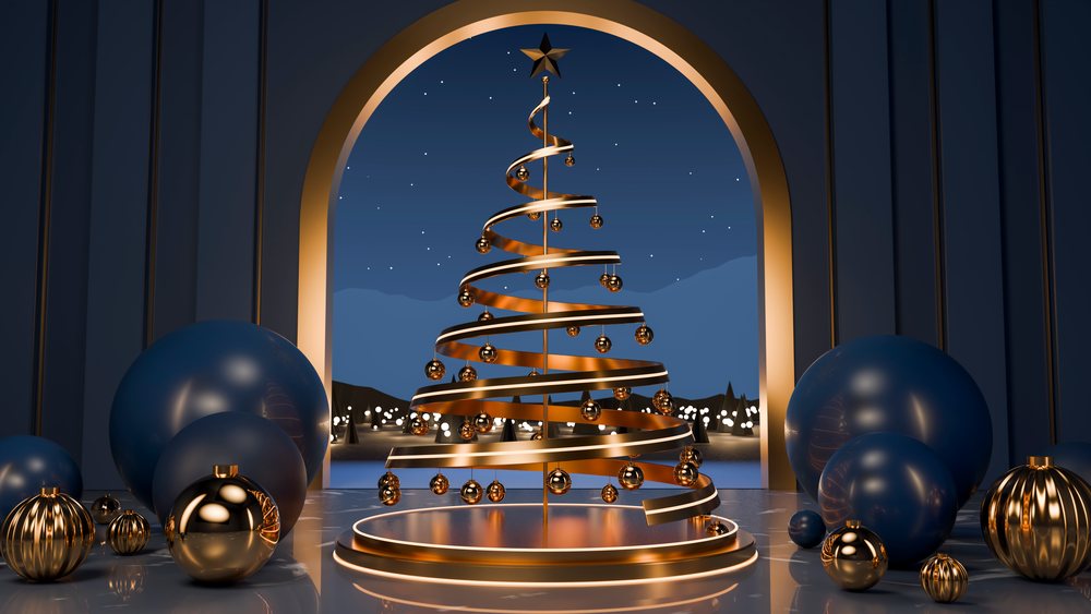 Gold spiral shaped Christmas tree with baubles and a star topper framed by an archway against a festive night sky with lights.