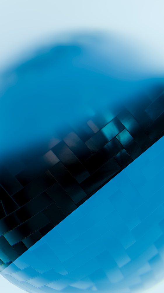 Abstract blue sphere exhibiting a geometric tile pattern and gradient lighting in a modern 3D digital artwork.