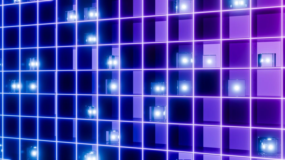 Glowing blue and purple digital grid with illuminated transparent cubes forming a futuristic geometric pattern.