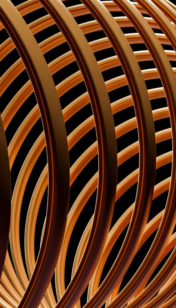 Copper coils forming an intricate spiral pattern with shiny, curved cylindrical tubes on a black background.