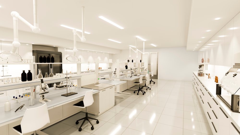 Modern laboratory with organized workbenches, microscopes, and scientific glassware in a clean, bright setting.