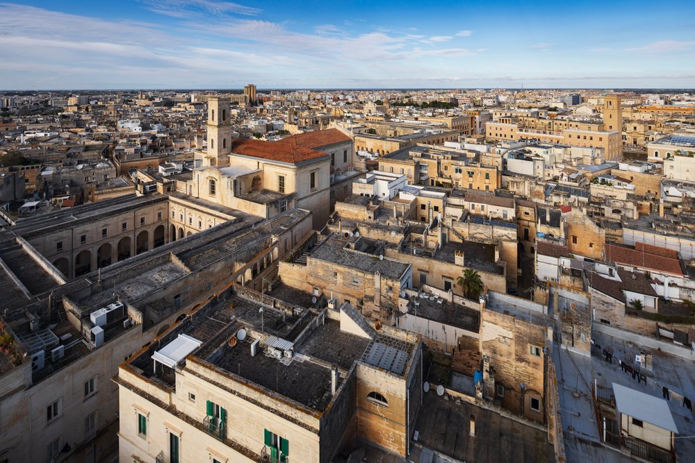 View from the Campanile of the Duomo di Lecce looking east over historic rooftops, Puglia, Italy.