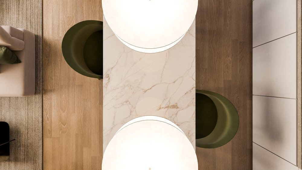 Overhead view of a marble table with two round pendant lights and green chairs in a modern living room interior.