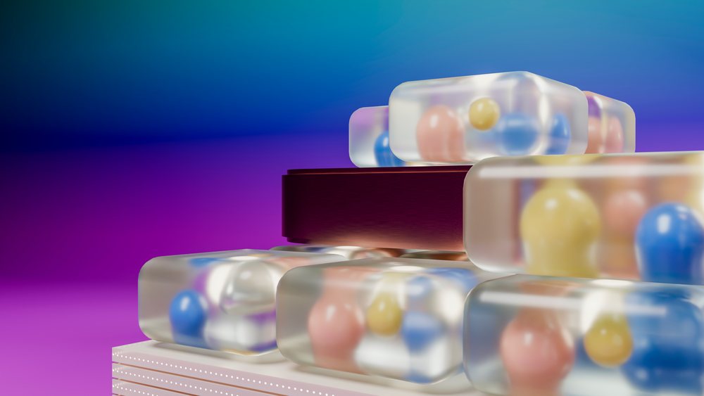 Stacked transparent blocks with pink, blue, and yellow spheres inside form an abstract 3D design against a blue to purple gradient background.