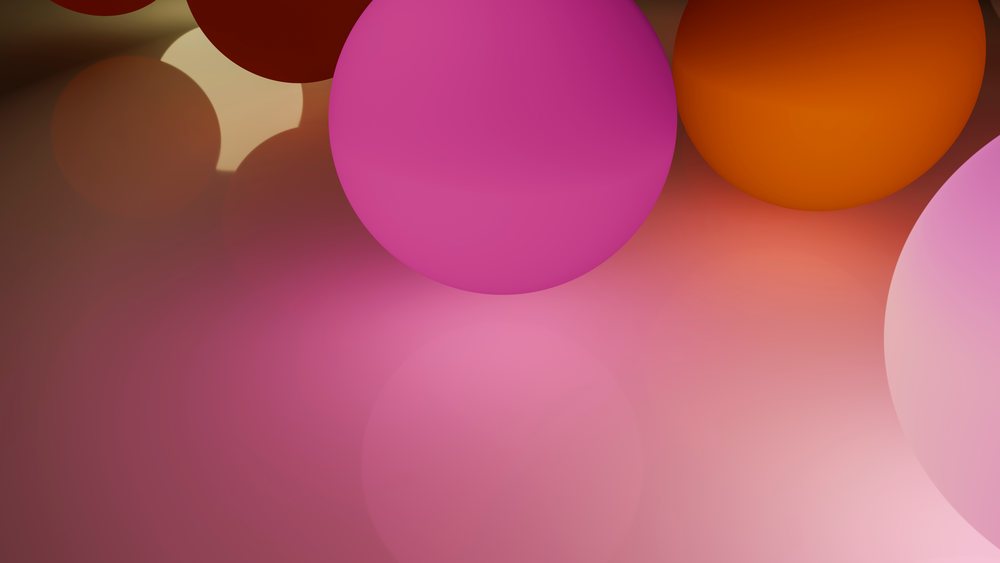 Digital abstract illustration featuring multiple colorful glossy spheres with smooth gradients and soft lighting.