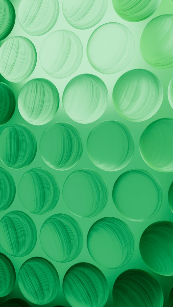 Abstract vertical pattern of green striped spheres creating a decorative geometric design.