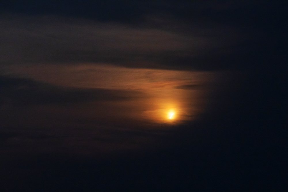 Diamond ring phase of a solar eclipse visible over Valldemossa during twilight, Landscape, Lifestyle, Mallorca, Spain.