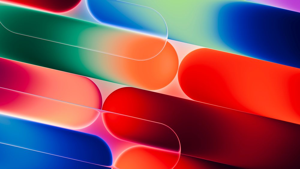 Abstract digital art with overlapping translucent rounded shapes and glowing vibrant gradients.