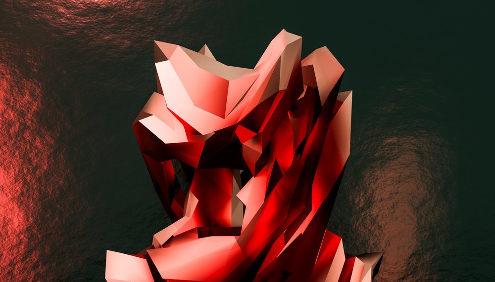 Red geometric faceted crystal with shiny reflective surfaces on a dark background.