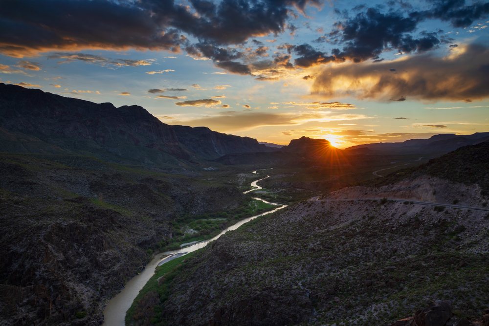 The Rio Grande river winds through desert mountains at sunset near Texas State Highway 170, Landscape, Wildlife, Lajitas, USA.