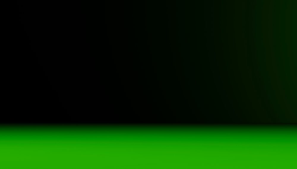 Background gradient transitioning smoothly from a vibrant green surface to darker green and black towards the top.