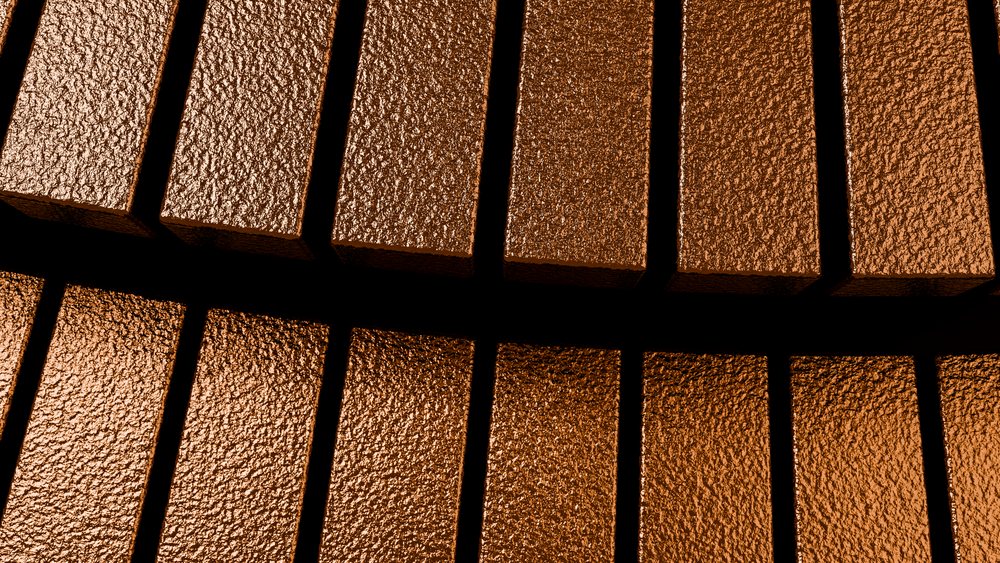 Close-up view of multiple textured chocolate bars arranged with gaps between them.