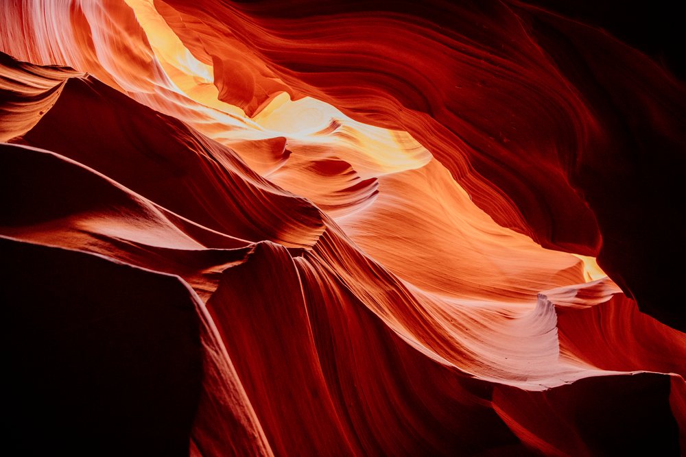 Antelope Canyon, features curved sandstone rock formations lit by natural light, Navajo Land, Arizona, USA.