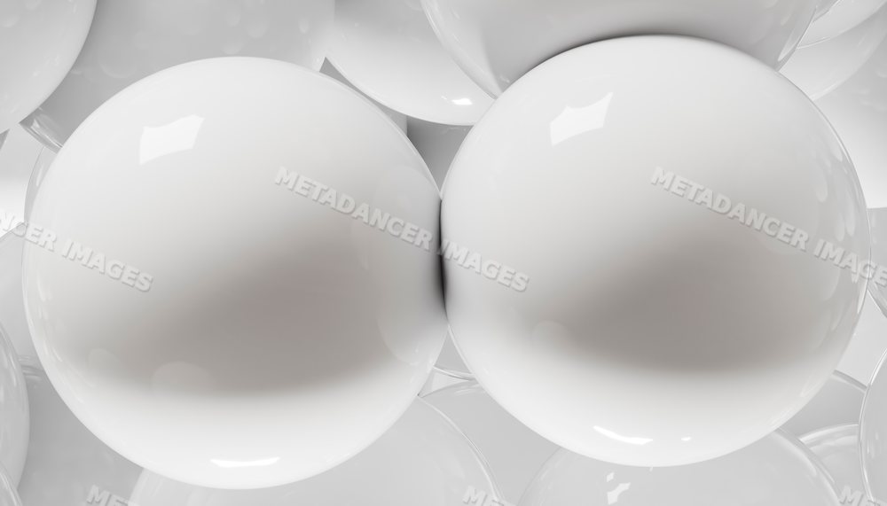Close-up of smooth white glossy spheres clustered