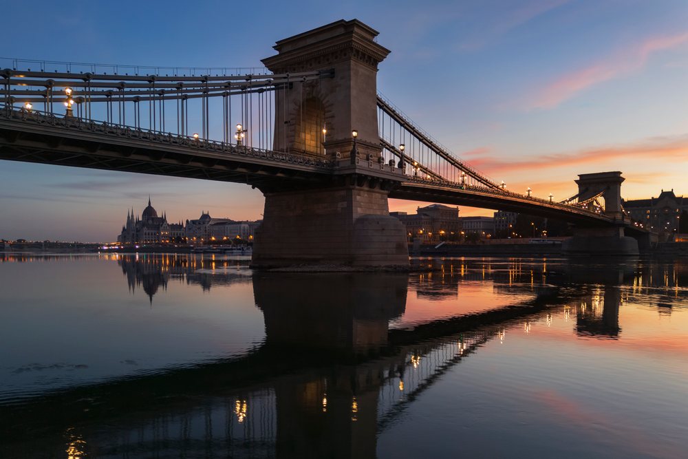 Chain Bridge and Hungarian Parliament building reflected in the Danube River at Dawn, Landscape, Budapest, Hungary.