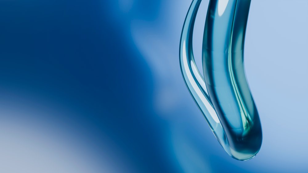 Abstract blue transparent glass shapes with smooth curves and shiny reflective surfaces in a fluid design.