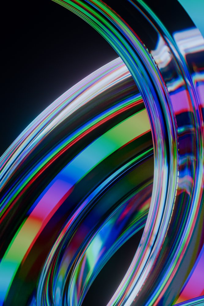Colorful transparent abstract rings with light reflections on a black background in a digital 3D render.