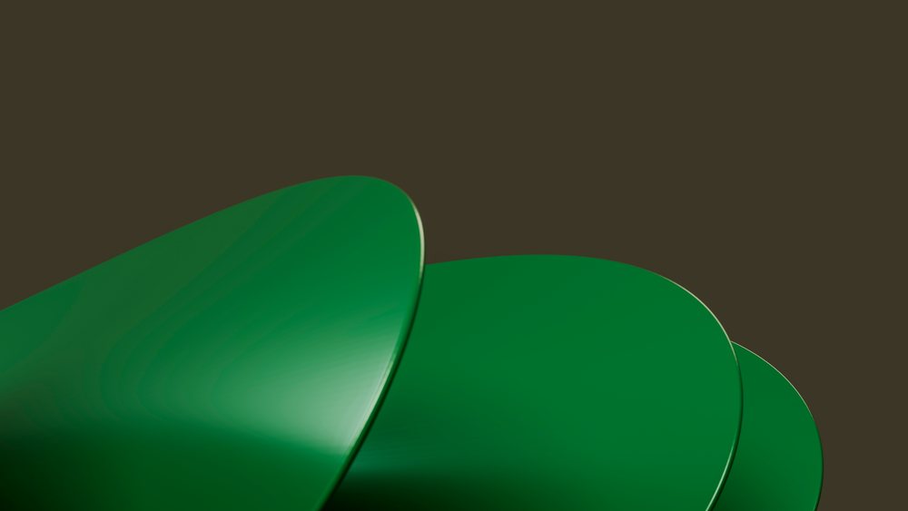 Three green metallic smooth curved shapes overlap against a dark background in a digital artwork.